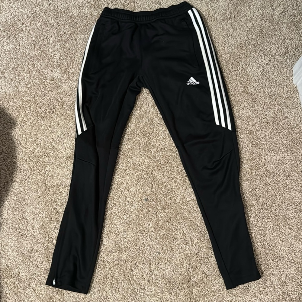Black Adidas track pants